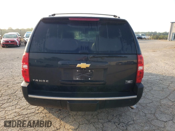 2014 Chevrolet Tahoe LTZ с VIN 1GNSKCE07ER137878, выставлен на аукционе Copart как лот 59905605 с пробегом 213 584 миль миль и Списание • Salvage title. История ставок и продаж доступна на DreamBid. Изображение 6.