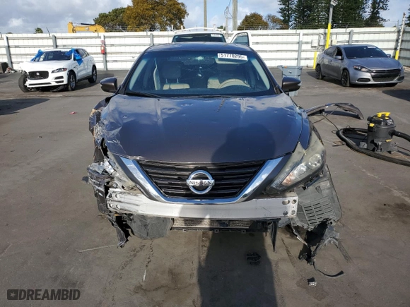 2016 Nissan Altima 3.5 SL with VIN 1N4BL3APXGC176825, listed as a Copart auction lot 51770295 with 142,321 mi miles and Salvage Title. Bid and sale history available at carsss.com. Image 5.