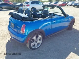 2007 MINI Convertible S with VIN WMWRH33547TL94374, listed as a IAAI auction lot 40910780 with 45,162 mi miles and . Bid and sale history available at DreamBid. Image 4.