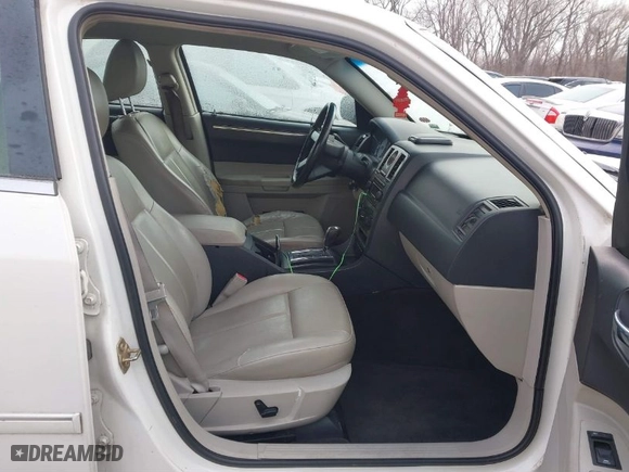2006 Chrysler 300 Touring with VIN 2C3KA53G36H525834, listed as a IAAI auction lot 41274514 with 147,302 mi miles. Bid and sale history available at carsss.com. Image 5.