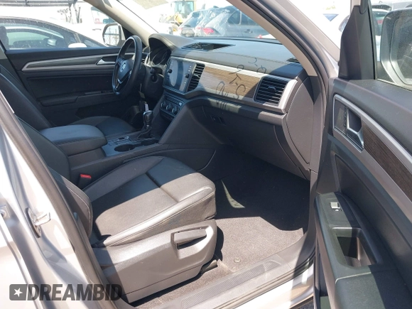 2018 Volkswagen Atlas SE with VIN 1V2DP2CA3JC599181, listed as a IAAI auction lot 42293017 with 70,589 mi miles and . Bid and sale history available at DreamBid. Image 5.