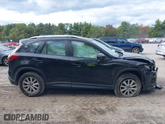 2016 Mazda CX-5 Sport with VIN JM3KE2BE8G0804398, listed as a IAAI auction lot 40490953 with 116,279 mi miles and . Bid and sale history available at DreamBid. Image 12.