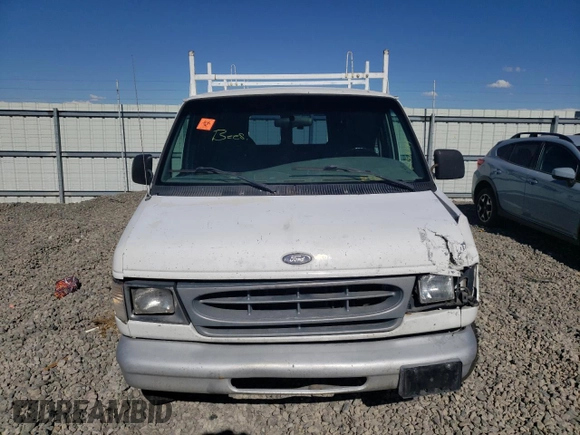 1999 Ford Econoline Cargo with VIN 1FTRE142XXHB29496, listed as a Copart auction lot 64516444 with 206,951 mi miles and Salvage Title. Bid and sale history available at carsss.com. Image 5.