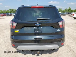 2017 Ford Escape SE z VIN 1FMCU0GD2HUC07371, wystawiony jako Copart lot #59223875 z przebiegiem 26 805 mil mil oraz Szkoda całkowita • Salvage title. Historia ofert i sprzedaży dostępna na DreamBid. Obrazek 6.