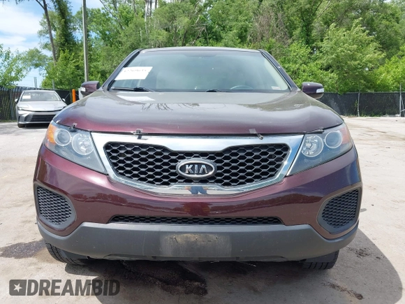 2012 Kia Sorento LX z VIN 5XYKT3A19CG286034, wystawiony jako IAAI lot #42269635 z przebiegiem 163 935 mil mil oraz . Historia ofert i sprzedaży dostępna na DreamBid. Obrazek 6.