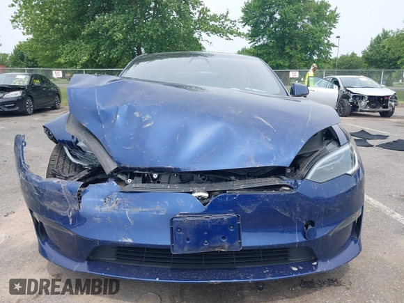 2022 Tesla Model S z VIN 5YJSA1E55NF493604, wystawiony jako IAAI lot #42503731 z przebiegiem 37 961 mil mil oraz . Historia ofert i sprzedaży dostępna na DreamBid. Obrazek 11.