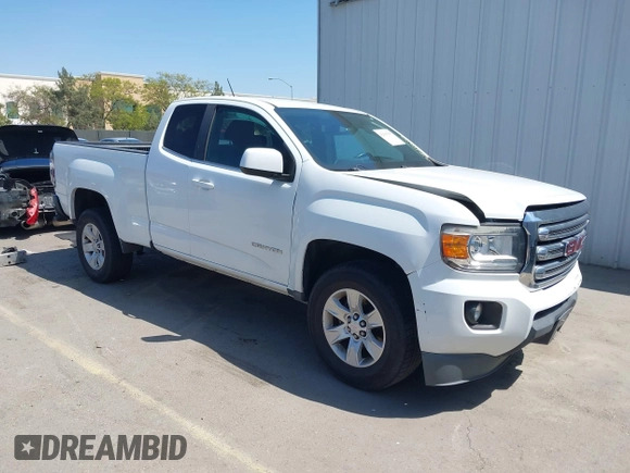 2015 GMC Canyon 2WD SLE z VIN 1GTH5BEA4F1239815, wystawiony jako IAAI lot #42135355 z przebiegiem 110 696 mil mil oraz . Historia ofert i sprzedaży dostępna na DreamBid. Obrazek 1.