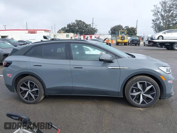 2023 Volkswagen ID.4 S z VIN 1V25MPE80PC051099, wystawiony jako IAAI lot #41332507 z przebiegiem 12 037 mil mil oraz . Historia ofert i sprzedaży dostępna na DreamBid. Obrazek 13.