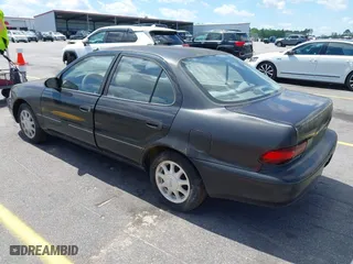 1996 Geo Prizm LSi with VIN 1Y1SK526XTZ026795, listed as a IAAI auction lot 42008701 with 178,017 mi miles. Bid and sale history available at carsss.com. Image 3.