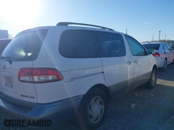 2001 Toyota Sienna LE with VIN 4T3ZF13C21U369974, listed as a IAAI auction lot 41821093 with 208,354 mi miles. Bid and sale history available at carsss.com. Image 4.