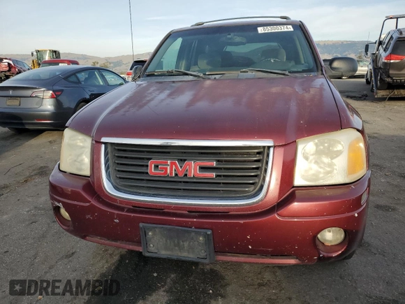 2003 GMC Envoy SLE with VIN 1GKDS13S732335607, listed as a Copart auction lot 85300374 with 305,651 mi miles and Salvage Title. Bid and sale history available at carsss.com. Image 5.
