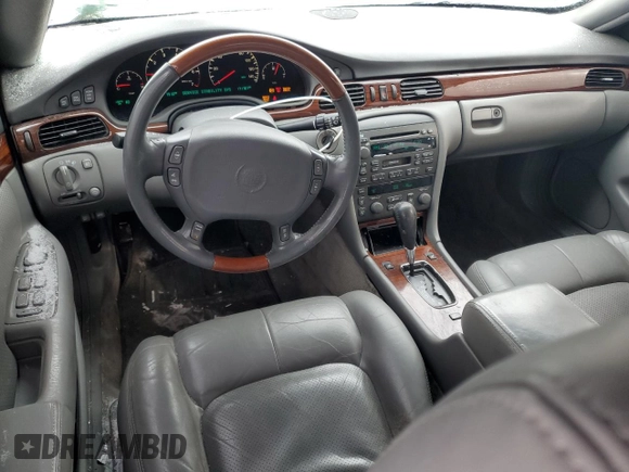 2002 Cadillac Seville Touring STS z VIN 1G6KY549X2U177791, wystawiony jako Copart lot #89313345 z przebiegiem 171 707 mil mil oraz Szkoda całkowita • Salvage title. Historia ofert i sprzedaży dostępna na DreamBid. Obrazek 8.
