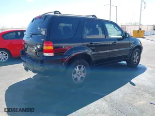 2005 Ford Escape Limited with VIN 1FMCU94165KE32639, listed as a IAAI auction lot 41960732 with 204,979 mi miles. Bid and sale history available at carsss.com. Image 4.