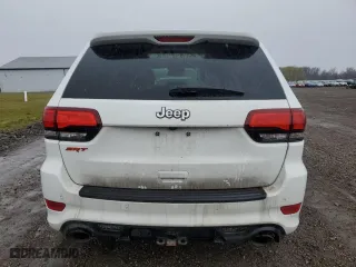 2015 Jeep Grand Cherokee SRT with VIN 1C4RJFDJ6FC941941, listed as a Copart auction lot 50613315 with 173,992 mi miles and Salvage Title. Bid and sale history available at carsss.com. Image 6.