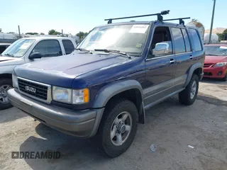 1996 Isuzu Trooper with VIN JACDJ58V9T7918352, listed as a IAAI auction lot 42834262 with 177,888 mi miles and . Bid and sale history available at DreamBid. Image 2.