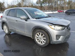 2014 Mazda CX-5 Grand Touring with VIN JM3KE2DY8E0304911, listed as a IAAI auction lot 41672197 with 77,523 mi miles. Bid and sale history available at carsss.com. Image 1.