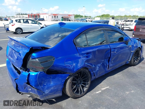 2016 Subaru WRX Premium with VIN JF1VA1E69G9828792, listed as a IAAI auction lot 42523907 with Not provided miles and . Bid and sale history available at DreamBid. Image 4.
