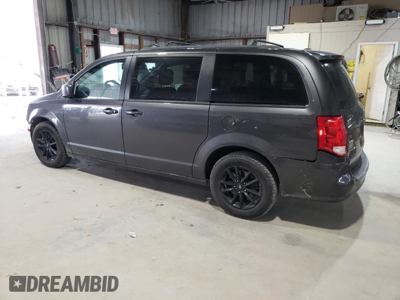 2019 Dodge Grand Caravan GT with VIN 2C4RDGEG9KR694822, listed as a Copart auction lot 50959695 with 121,697 mi miles and Salvage Title. Bid and sale history available at DreamBid. Image 2.