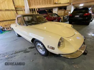 1973 Alfa Romeo Spider z VIN AR3041681, wystawiony jako Copart lot #51425165 z przebiegiem 20 513 mil mil oraz Tytuł czysty. Historia ofert i sprzedaży dostępna na DreamBid. Obrazek 1.