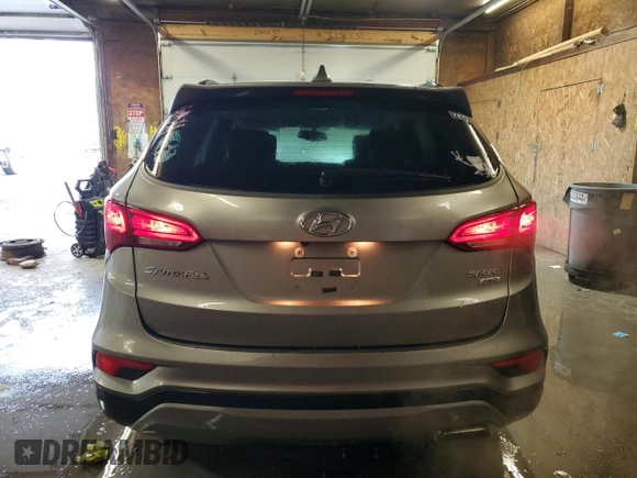 2017 Hyundai Santa Fe 2.4L z VIN 5XYZUDLBXHG415400, wystawiony jako Copart lot #58330205 z przebiegiem 116 196 mil mil oraz Szkoda całkowita • Salvage title. Historia ofert i sprzedaży dostępna na DreamBid. Obrazek 6.