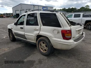 1999 Jeep Grand Cherokee Limited with VIN 1J4G268S2XC756532, listed as a Copart auction lot 71222174 with 279,300 mi miles and Salvage title. Bid and sale history available at DreamBid. Image 2.