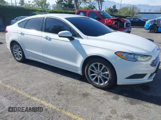 2017 Ford Fusion SE z VIN 3FA6P0HD3HR313719, wystawiony jako IAAI lot #42153259 z przebiegiem 115 532 mil mil oraz . Historia ofert i sprzedaży dostępna na DreamBid. Obrazek 1.
