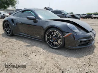 2022 Porsche 911 Turbo S with VIN WP0AD2A96NS256060, listed as a Copart auction lot 54003744 with 13,169 mi miles and Salvage Title. Bid and sale history available at carsss.com. Image 4.