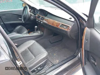 2007 BMW 5 Series 530i with VIN WBANE73597CM56897, listed as a IAAI auction lot 42113113 with 212,774 mi miles. Bid and sale history available at carsss.com. Image 5.