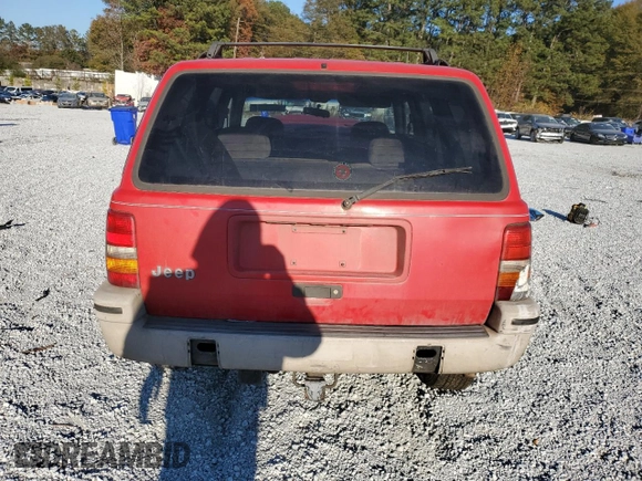 1995 Jeep Grand Cherokee Laredo with VIN 1J4GZ58S7SC747906, listed as a Copart auction lot 82529374 with 73,932 mi miles and Salvage Title. Bid and sale history available at carsss.com. Image 6.