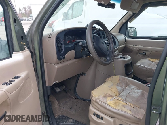 2002 Ford Econoline Passenger XL with VIN 1FMRE11L82HA83636, listed as a IAAI auction lot 41718025 with 153,581 mi miles and . Bid and sale history available at DreamBid. Image 5.