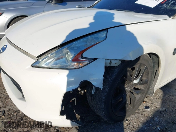 2015 Nissan 370Z Sport with VIN JN1AZ4EH0FM440627, listed as a IAAI auction lot 41410844 with 99,420 mi miles. Bid and sale history available at carsss.com. Image 6.