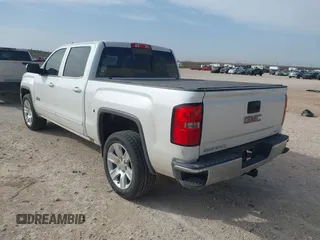 2017 GMC Sierra 1500 SLE z VIN 3GTP1MEC3HG198599, wystawiony jako IAAI lot #41793527 z przebiegiem 143 207 mil mil oraz . Historia ofert i sprzedaży dostępna na DreamBid. Obrazek 3.