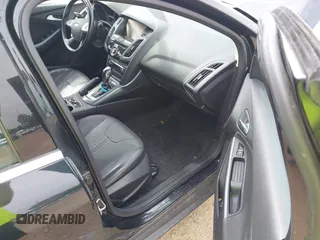 2014 Ford Focus Titanium with VIN 1FADP3N25EL194433, listed as a IAAI auction lot 42512912 with 105,355 mi miles and . Bid and sale history available at DreamBid. Image 5.