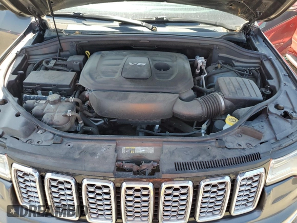 2017 Jeep Grand Cherokee Overland with VIN 1C4RJFCGXHC941983, listed as a Copart auction lot 52008825 with 65,776 mi miles and Salvage Title. Bid and sale history available at carsss.com. Image 11.