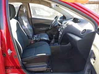 2010 Toyota Yaris with VIN JTDBT4K39A4070153, listed as a IAAI auction lot 41519671 with 169,090 mi miles and . Bid and sale history available at carsss.com. Image 5.