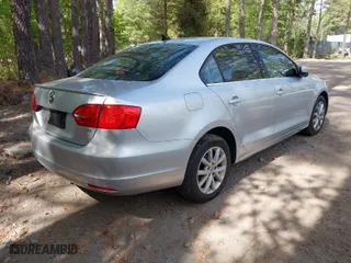 2014 Volkswagen Jetta Sedan SE with VIN 3VWD07AJ9EM254034, listed as a IAAI auction lot 42079707 with 153,060 mi miles. Bid and sale history available at carsss.com. Image 4.