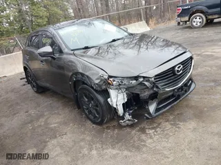 2016 Mazda CX-3 Touring with VIN JM1DKBC70G0116065, listed as a IAAI auction lot 41556961 with 71,750 mi miles. Bid and sale history available at carsss.com. Image 1.