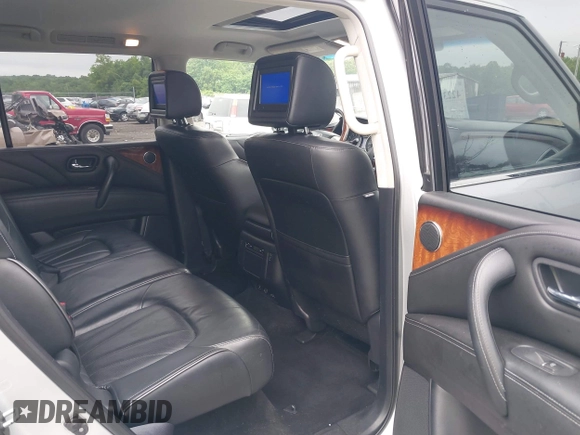 2016 Infiniti QX80 z VIN JN8AZ2NC0G9403107, wystawiony jako IAAI lot #42232384 z przebiegiem 98 763 mil mil oraz . Historia ofert i sprzedaży dostępna na DreamBid. Obrazek 8.