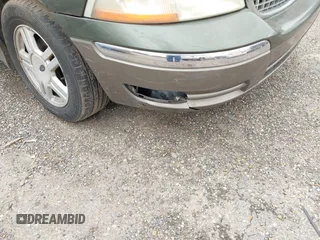 2003 Ford Windstar SEL z VIN 2FMZA53483BB41431, wystawiony jako IAAI lot #41704907 z przebiegiem 125 245 mil mil oraz . Historia ofert i sprzedaży dostępna na DreamBid. Obrazek 6.