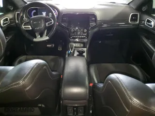 2021 Jeep Grand Cherokee SRT with VIN 1C4RJFDJ5MC667774, listed as a Copart auction lot 42484435 with 43,387 mi miles and Salvage Title. Bid and sale history available at carsss.com. Image 8.