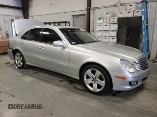 2007 Mercedes-Benz E 550 with VIN WDBUF72X97B017766, listed as a Copart auction lot 48523515 with 299,578 mi miles and Salvage Title. Bid and sale history available at DreamBid. Image 4.