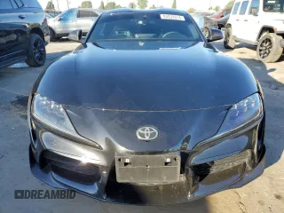 2022 Toyota GR Supra 2.0 with VIN WZ1DB2C08NW047883, listed as a Copart auction lot 84032614 with 26,907 mi miles and Salvage Title. Bid and sale history available at carsss.com. Image 5.