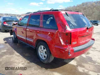 2010 Jeep Grand Cherokee Laredo with VIN 1J4PR4GK9AC143199, listed as a IAAI auction lot 41972153 with 81,896 mi miles. Bid and sale history available at carsss.com. Image 3.