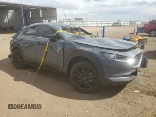 2023 Mazda CX-30 2.5 S Carbon Edition with VIN 3MVDMBCM1PM578257, listed as a Copart auction lot 53824765 with 25,599 mi miles and Salvage Title. Bid and sale history available at carsss.com. Image 4.