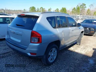 2011 Jeep Compass with VIN 1J4NT1FB8BD248904, listed as a IAAI auction lot 41667133 with 212,887 mi miles. Bid and sale history available at carsss.com. Image 4.