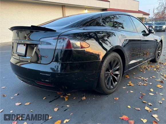 2017 Tesla Model S 60 with VIN 5YJSA1E15HF219286, listed as a Copart auction lot 84771024 with 43,259 mi miles and Salvage title. Bid and sale history available at DreamBid. Image 4.