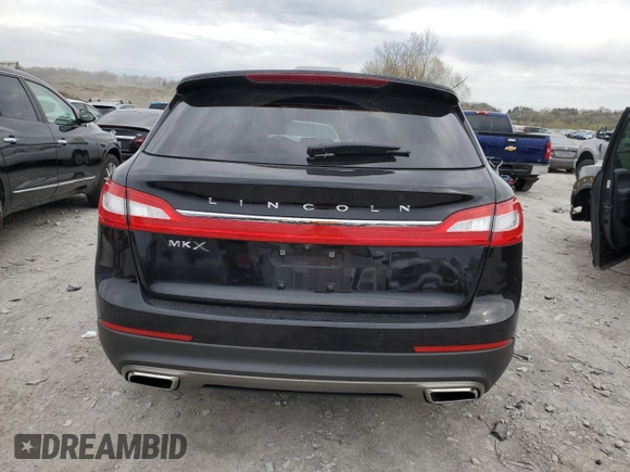 2018 Lincoln MKX Reserve z VIN 2LMPJ6LRXJBL12495, wystawiony jako Copart lot #52304905 z przebiegiem 97 879 mil mil oraz Szkoda całkowita • Salvage title. Historia ofert i sprzedaży dostępna na DreamBid. Obrazek 6.