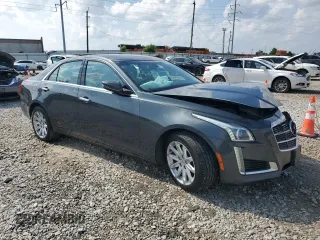 2014 Cadillac CTS AWD with VIN 1G6AW5SX9E0133215, listed as a Copart auction lot 61052055 with 179,614 mi miles and Salvage title. Bid and sale history available at DreamBid. Image 4.