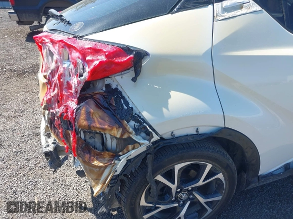 2018 Toyota C-HR XLE z VIN NMTKHMBXXJR041817, wystawiony jako IAAI lot #42174035 z przebiegiem 86 669 mil mil oraz . Historia ofert i sprzedaży dostępna na DreamBid. Obrazek 12.