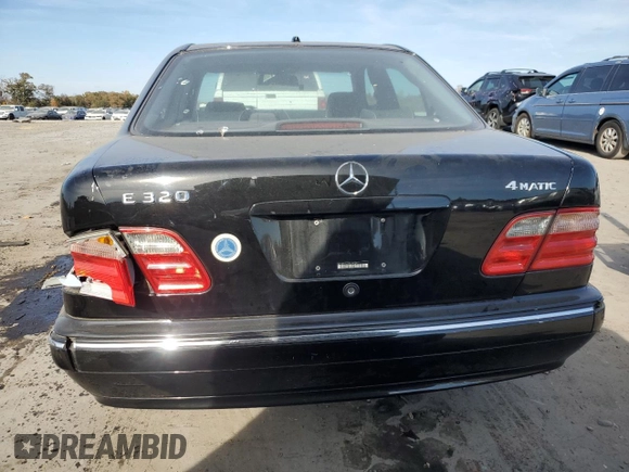 2000 Mercedes-Benz E-Class AWD with VIN WDBJF82J4YX039134, listed as a Copart auction lot 78083864 with 172,264 mi miles and Salvage Title. Bid and sale history available at carsss.com. Image 6.
